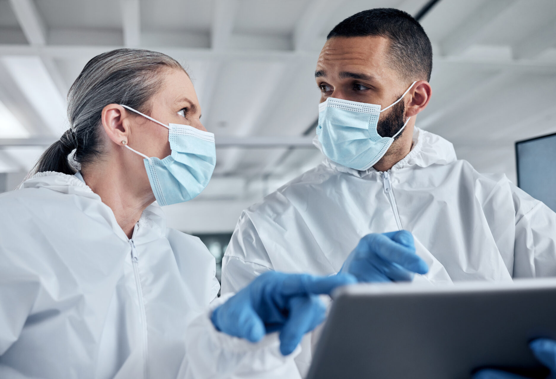 Two scientists having a discussion.